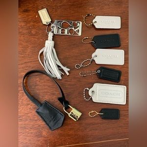 Miscellaneous purse tags. Mostly Coach